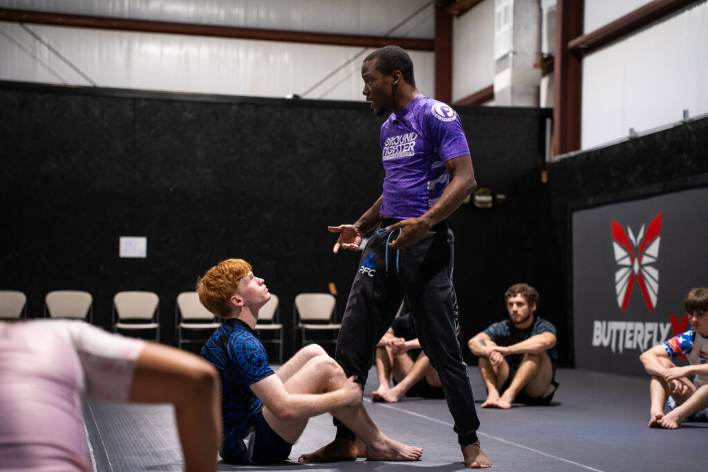 Instructor teaching class in front of students